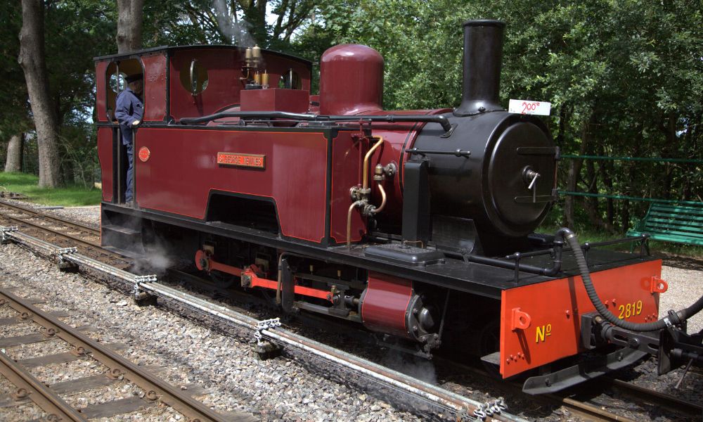 Steam train at Woody Bay station on the Lynton and Barnstaple Railway in North Devon