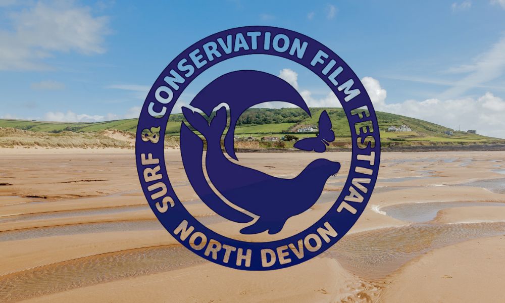 Surf and Conservation Film Festival logo over picture of Croyde beach with it's sand and blue sky